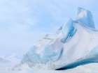 Iceberg in the frozen Mohnbukta in Sabine-Land. Spitzbergen in the Svalbard. Scandinavia, Norway. Art Print
